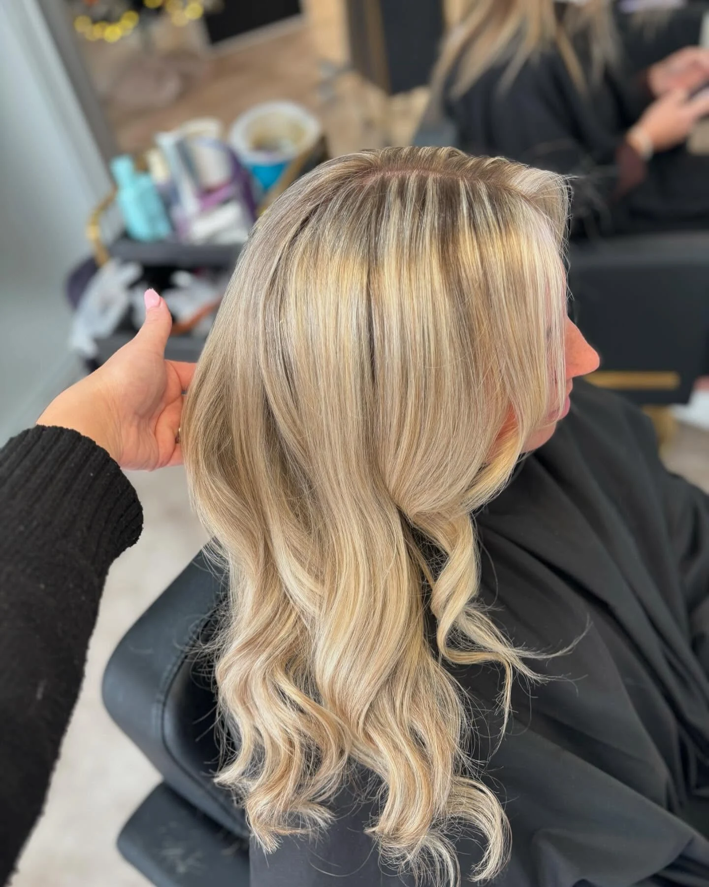 Blonde face frame and fine baby lights created by Alex Slater