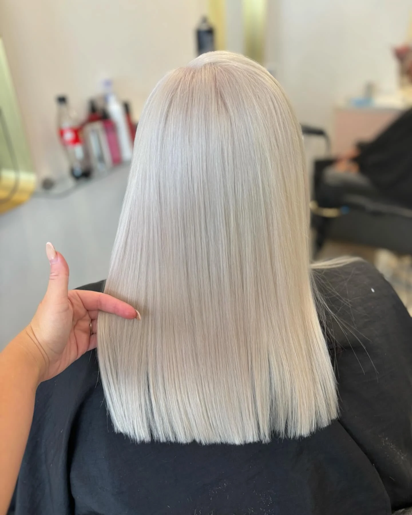 Clean, straight ice-white blonde created by Alex Slater