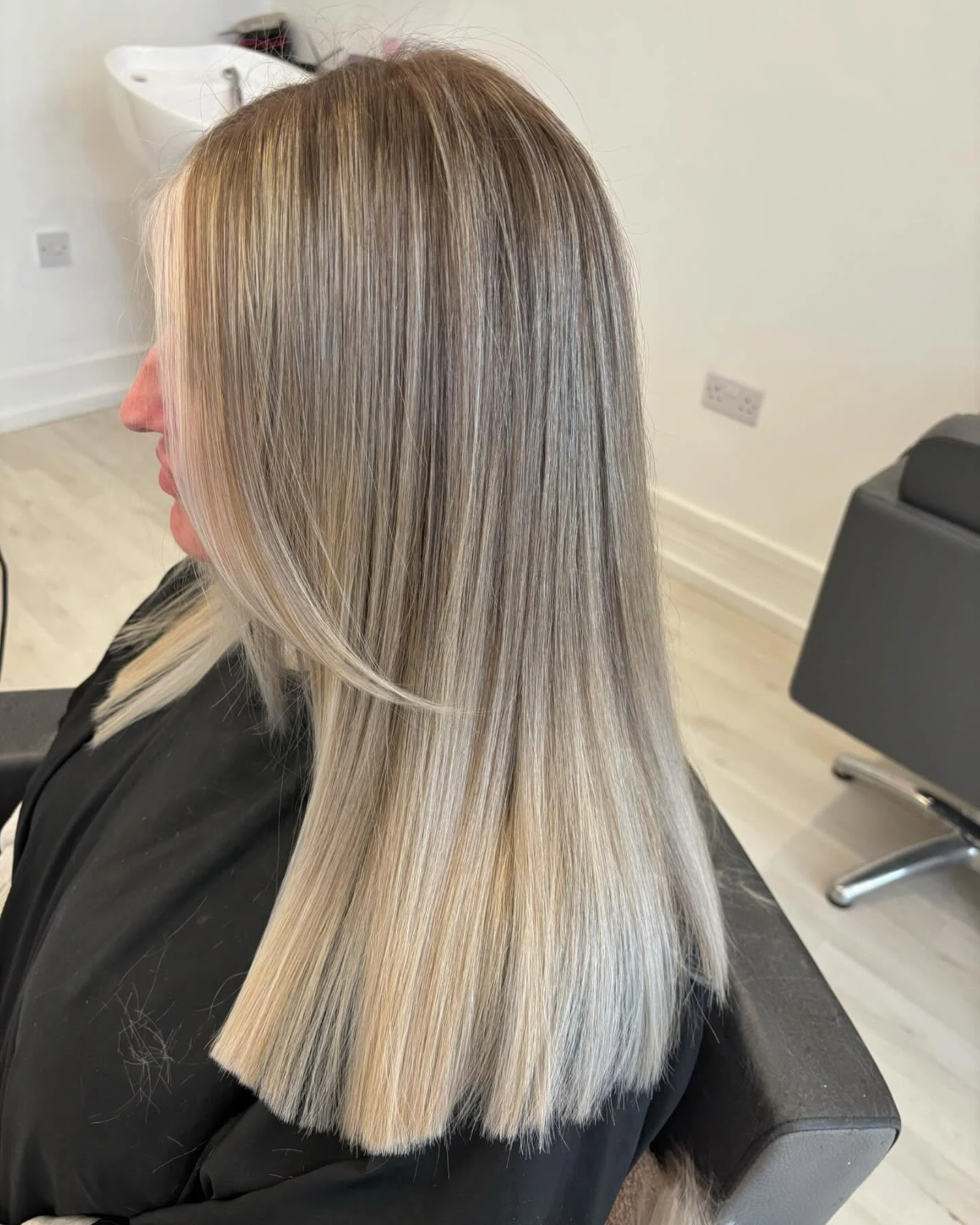 Natural-root balayage with a soft blonde blend by Alex Slater